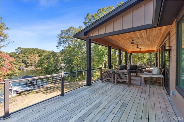 12437 Rising Tide, Northport, AL 35475 - wooden terrace featuring an outdoor hangout area, a water view, and ceiling fan