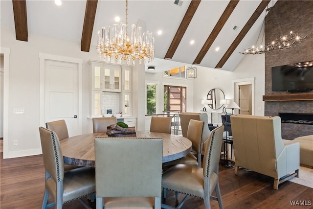 12437 Rising Tide, Northport, AL 35475 - dining room featuring beam ceiling, dark hardwood / wood-style flooring, a fireplace, and high vaulted ceiling