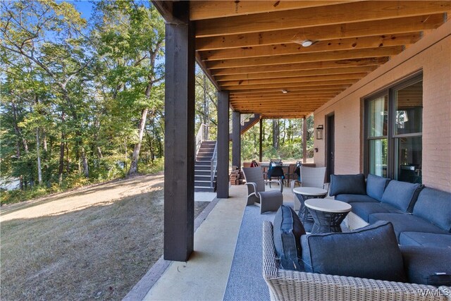 12437 Rising Tide, Northport, AL 35475 - view of patio / terrace with an outdoor living space