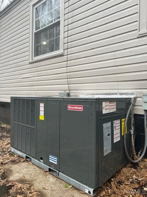 exterior details featuring crawl space and cooling unit