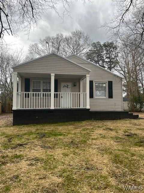 bungalow-style home featuring covered porch