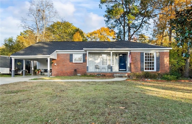 ranch-style home with a front lawn and a carport