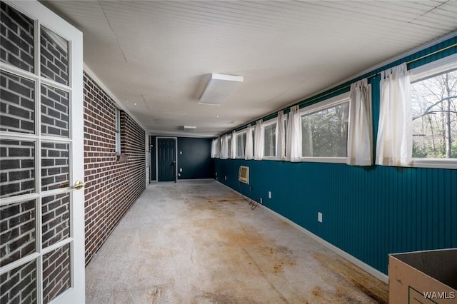 interior space with brick wall