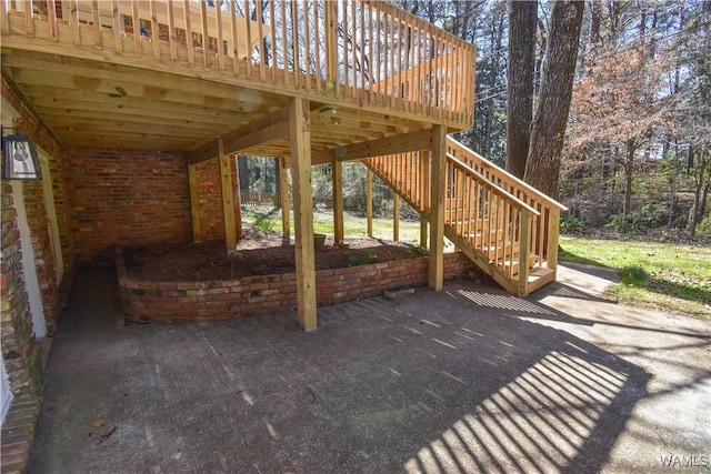 view of patio featuring stairs and a wooden deck