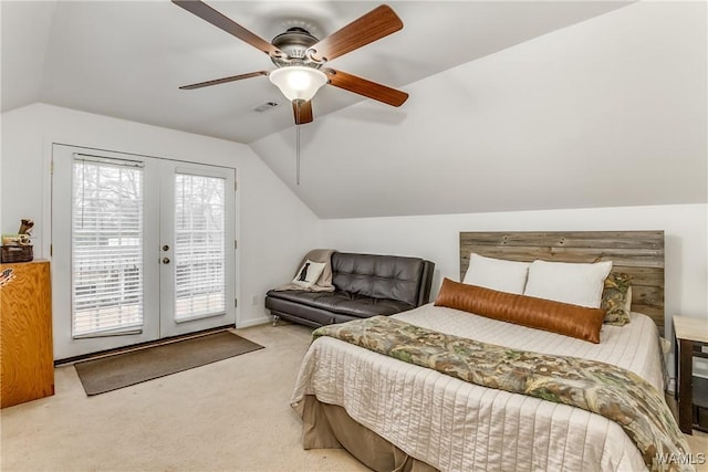 carpeted bedroom featuring visible vents, ceiling fan, access to outside, vaulted ceiling, and french doors