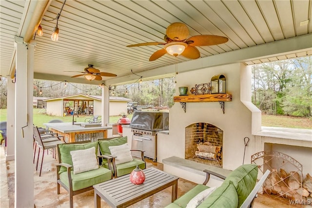 sunroom / solarium with wooden ceiling and exterior fireplace