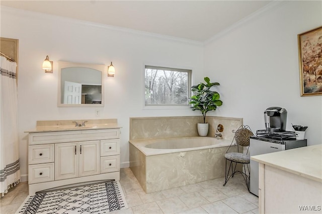 bathroom featuring ornamental molding, a garden tub, vanity, and tile patterned floors