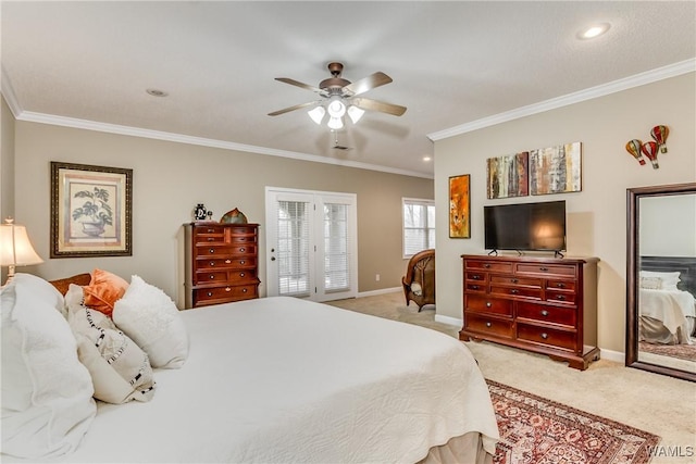 bedroom featuring a ceiling fan, light colored carpet, crown molding, and baseboards