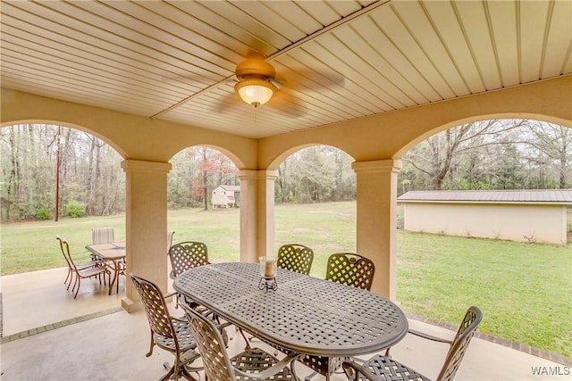 view of patio / terrace featuring ceiling fan and outdoor dining space