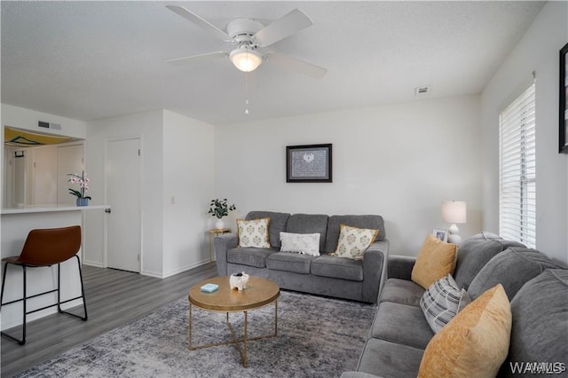 1009 12th St Unit 22, Tuscaloosa, AL 35401 - living room with dark wood-style flooring and ceiling fan