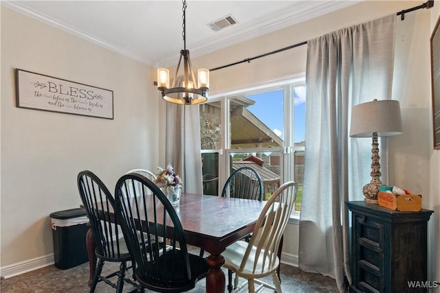 dining room with visible vents, crown molding, baseboards, and an inviting chandelier