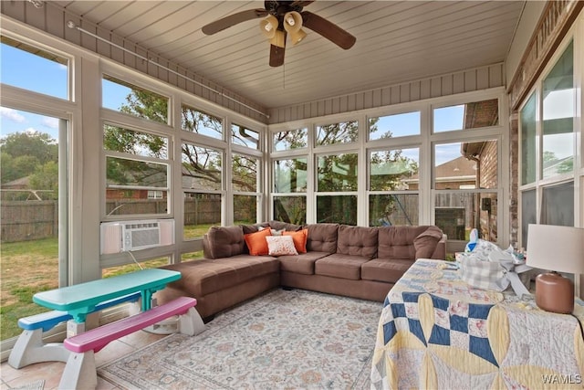 sunroom / solarium featuring an outdoor living space, a ceiling fan, and cooling unit