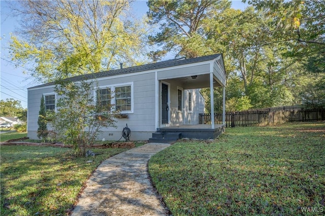 view of front of house with a front lawn