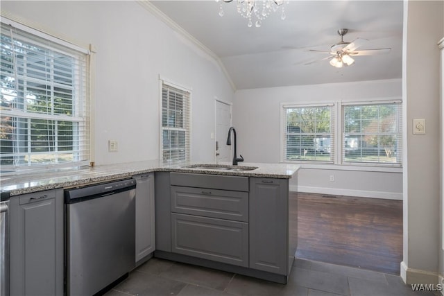 kitchen featuring sink, gray cabinets, light stone countertops, and dishwasher