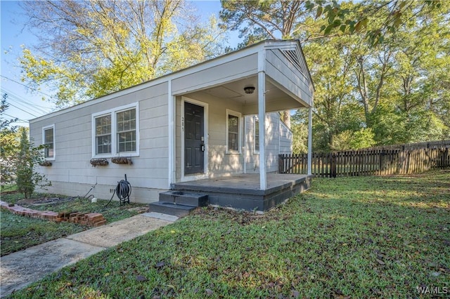 exterior space with a front lawn