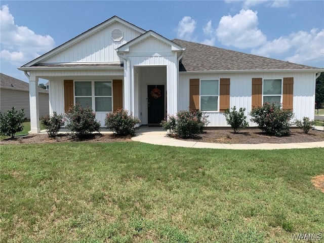 7106 Dowery Dell Way, Northport, AL 35473 - ranch-style house with a shingled roof and a front lawn