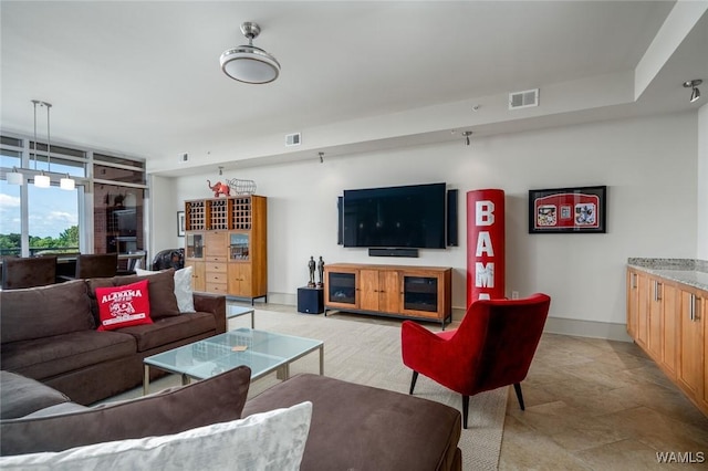 1018 Hackberry Ln Unit 404, Tuscaloosa, AL 35401 - living room with baseboards