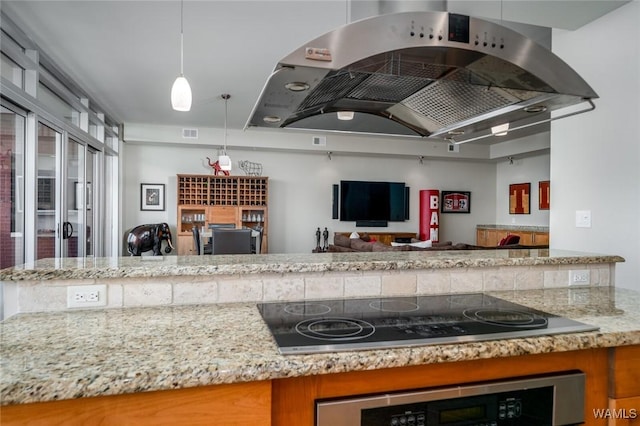 1018 Hackberry Ln Unit 404, Tuscaloosa, AL 35401 - kitchen featuring island range hood, oven, open floor plan, black electric cooktop, and light stone counters