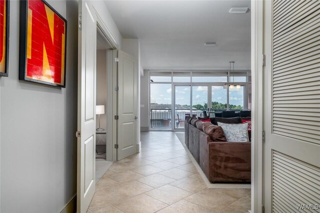 1018 Hackberry Ln Unit 404, Tuscaloosa, AL 35401 - hallway with light tile patterned flooring