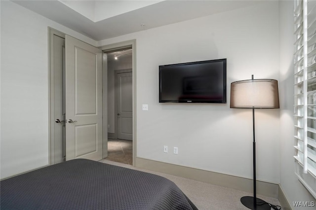 1018 Hackberry Ln Unit 404, Tuscaloosa, AL 35401 - bedroom with carpet and baseboards