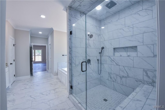 bathroom with independent shower and bath and ornamental molding