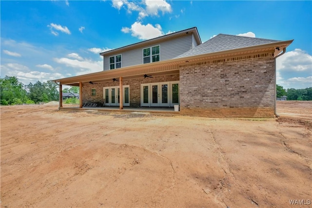 rear view of property featuring ceiling fan, french doors, and a patio