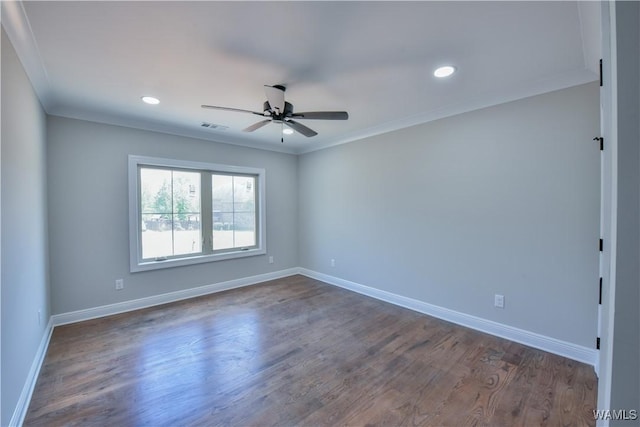 unfurnished room featuring dark hardwood / wood-style flooring, ceiling fan, and ornamental molding