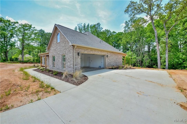 view of side of home featuring a carport