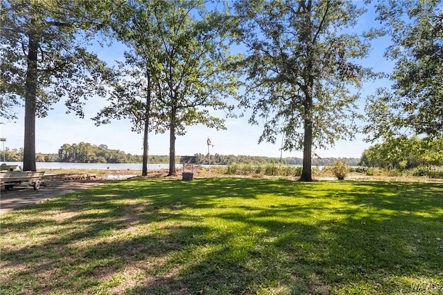 view of yard with a water view