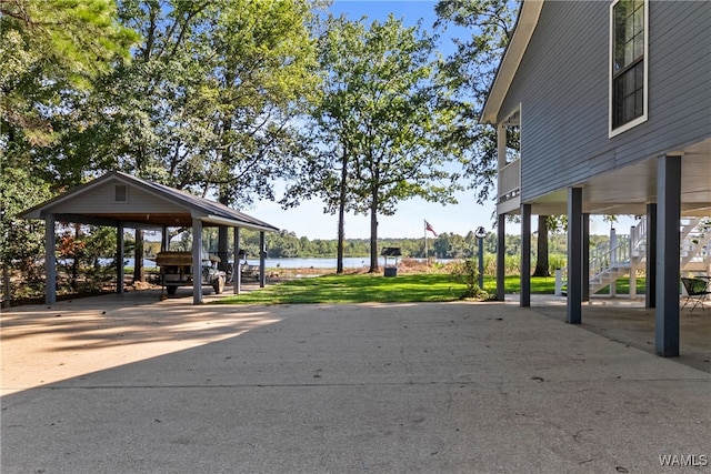 view of home's community with a water view