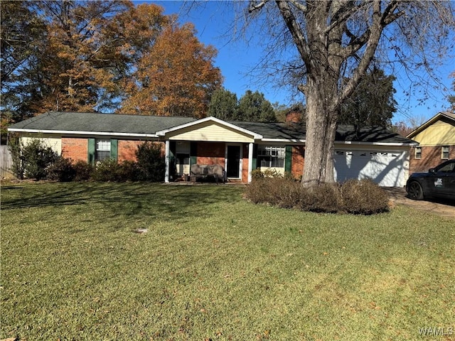 single story home with a front yard and a garage