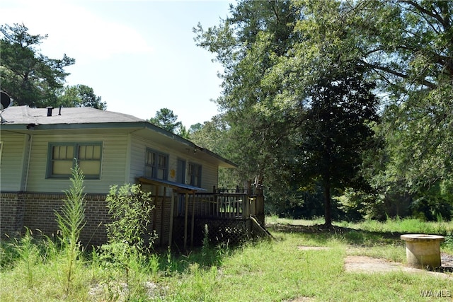 view of yard with a deck