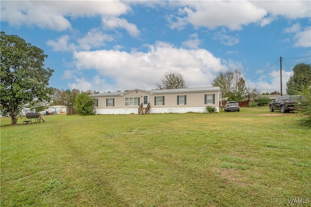 view of front of house with a front yard