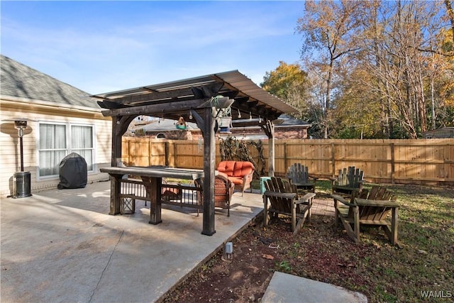 view of patio with a fenced backyard and a pergola