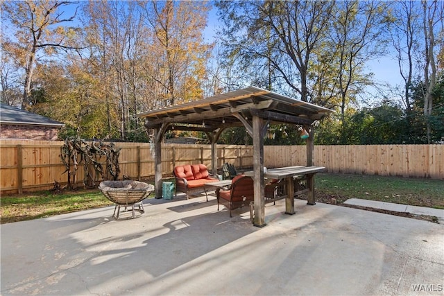 view of patio featuring a fenced backyard and an outdoor hangout area