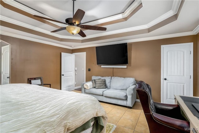 12280 Viewpoint Rd, Northport, AL 35475 - bedroom with light tile patterned floors, arched walkways, a ceiling fan, a tray ceiling, and crown molding