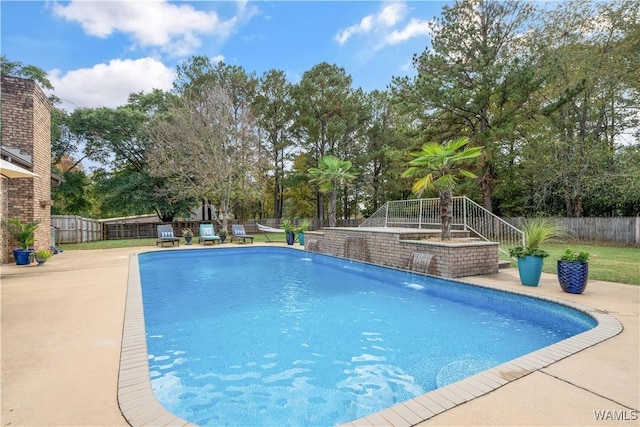 view of swimming pool with a fenced in pool, a patio area, and a fenced backyard