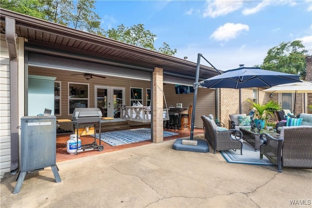 12280 Viewpoint Rd, Northport, AL 35475 - view of patio featuring french doors, grilling area, and an outdoor hangout area