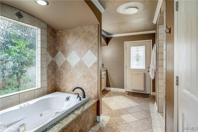 12280 Viewpoint Rd, Northport, AL 35475 - bathroom featuring ornamental molding, a jetted tub, baseboards, and tile patterned floors