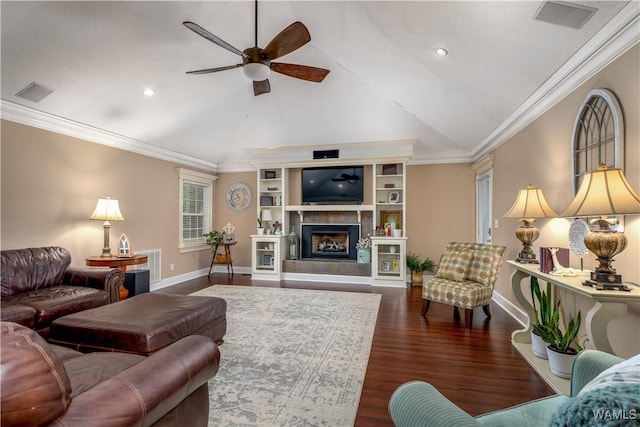 12280 Viewpoint Rd, Northport, AL 35475 - living area featuring a fireplace with raised hearth, ornamental molding, dark wood-style floors, and visible vents