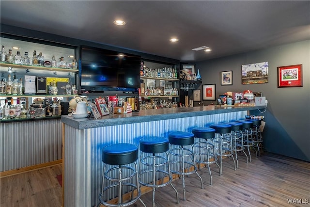 12280 Viewpoint Rd, Northport, AL 35475 - bar featuring a dry bar, visible vents, wood finished floors, and recessed lighting