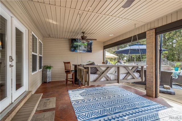 12280 Viewpoint Rd, Northport, AL 35475 - sunroom featuring a ceiling fan, wooden ceiling, and a healthy amount of sunlight