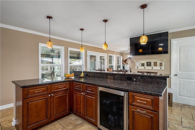 12280 Viewpoint Rd, Northport, AL 35475 - kitchen with ornamental molding, hanging light fixtures, wine cooler, and dark stone countertops