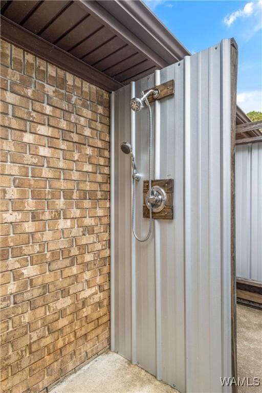 12280 Viewpoint Rd, Northport, AL 35475 - exterior details with a shower and brick siding