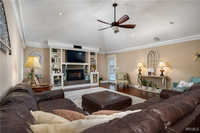 12280 Viewpoint Rd, Northport, AL 35475 - living room featuring baseboards, a ceiling fan, a tiled fireplace, wood finished floors, and crown molding