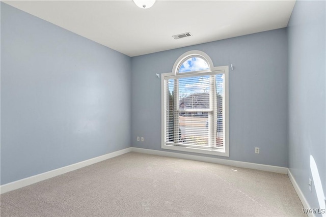 empty room with carpet floors