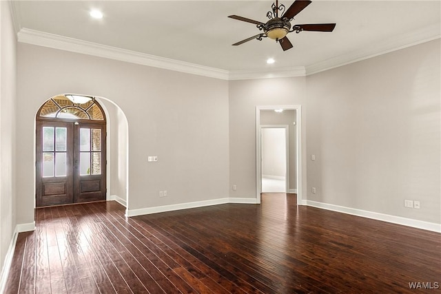 entrance foyer with crown molding, dark hardwood / wood-style floors, ceiling fan, and french doors