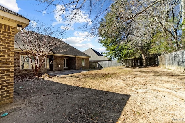 view of yard with a patio area