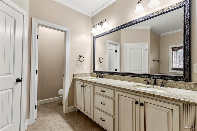 bathroom with vanity, tile patterned flooring, ornamental molding, and toilet