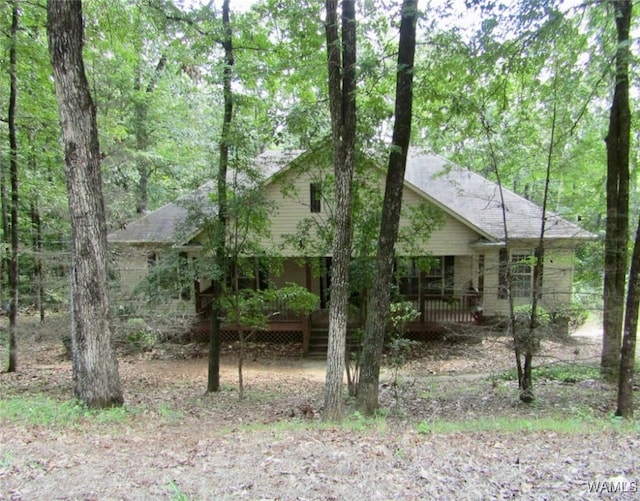 view of front of house with a wooden deck